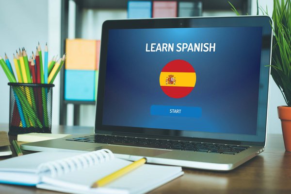 Learning Spanish on the laptop.